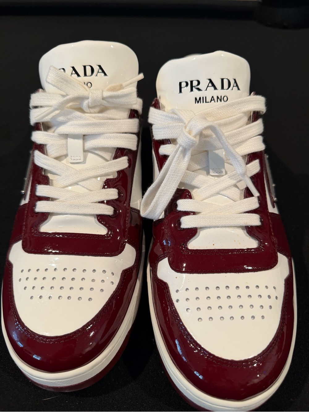 Prada Glossy White and Burgundy Patent Leather Low-Top Sneakers